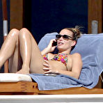 Second pic of Molly Sims caught in bikini on the beach in Mexico
