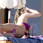 Third pic of Molly Sims caught in bikini on the beach in Mexico