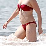 Second pic of Elisabeth Harnois in red bikini on a beach