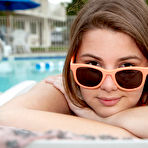 Fourth pic of Cute bikini girl Lindsay hangs out at a motel pool and models her pretty feet