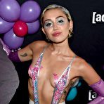Second pic of Miley Cyrus almost topless on a stage at 2015 Adult Swim Upfront Party