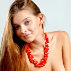 Third pic of Nice-nelly red haired teen Indiana A entices with her nude body and red beads