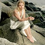 Third pic of Emilie De Ravin posing in nature photoshoot