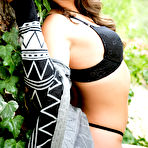 Third pic of Allie Haze takes off her poncho and her black lingerie in the woods and reveals everything