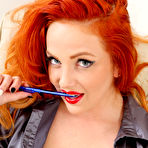 Second pic of Kara Carter Blazing Redhead Strips to Sheer Pantyhose
