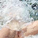 Third pic of The splashes of warm water are covering the absolutely naked body of April E