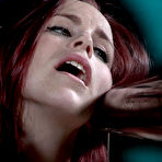 First pic of SexPreviews - Bella Rossi pantyhose redhead is bound between metal pipes in dungeon