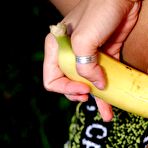 Third pic of Exciting outdoor closeups with Judit ALS packing her shaved pussy slit with banana