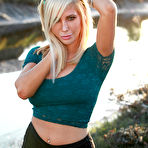 First pic of Charming chippy Tasha Reign is posing outdoor in her tiny top and shorts