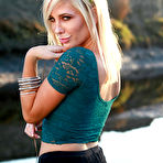 Fourth pic of Charming chippy Tasha Reign is posing outdoor in her tiny top and shorts