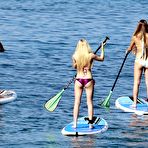 Third pic of Ava Sambora paddleboarding in Hawaii