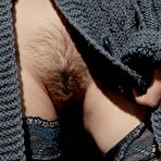 Second pic of Outdoor loving beauty Milena D shows off her hairy pussy and hot tits in public.