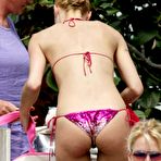 Third pic of Michelle Hunziker caught in bikini on the beach in Miami