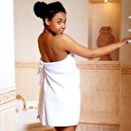 First pic of Charming black bimbo Gana A is not going to hide her shaved pussy under the towel
