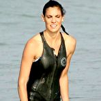 Second pic of Daniela Ruah surfing on the beach