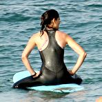 Third pic of Daniela Ruah surfing on the beach