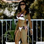 Fourth pic of Danielle Staub caught in bikini by the pool