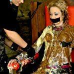 Third pic of Gagged and tied to chair clothed blonde Gina Killmer gets drenched in sticky liquid