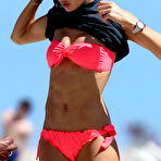 Second pic of Doutzen Kroes in pink bikini on the beach paparazzi shots