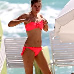 Third pic of Doutzen Kroes in pink bikini on the beach paparazzi shots