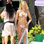 Fourth pic of Erin Heatherton shooting swimsuit photocall