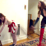 Second pic of Slave girl Clarity in red and white skirt gets seriously spanked by sexy dressed domina