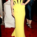 First pic of January Jones shows cleavage in yellow night dress