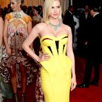 Third pic of January Jones shows cleavage in yellow night dress