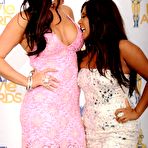 First pic of Busty Jenni Farley AKA JWOWW posing at MTV Movie Awards, shows legs and cleavage