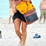 Third pic of Jenni Farley shows cleavage in bikini on the beach