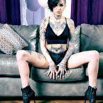 Second pic of 
      Leigh Raven exposes her inked body in the living room
    