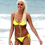 First pic of Karissa Shannon sexy in yellow bikini on the beach