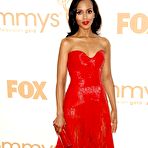Third pic of Kerry Washington posing in red dress at Emmy Awards
