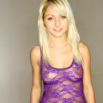 First pic of Cute blonde darling Pinky June is ready to take off that purple top and show her tits.