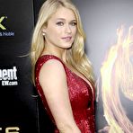 First pic of Leven Rambin shows cleavage in red night dress at premiere