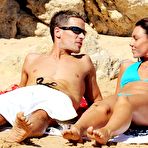 Fourth pic of British popstar Michelle Heaton caught in sexy bikini on a beach with honey