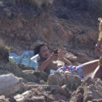 Third pic of Heidi Klum topless at a beach in Italy