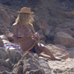 Fourth pic of Heidi Klum topless at a beach in Italy