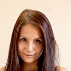 First pic of Petite teen Vanessa Angel lets her long brunette hair down and shows her un shaved pussy.