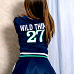 Second pic of FilthyNubiles.com's gallery :: nice lovely cheerleader babe willing to goes wilder and hotter than posing cute