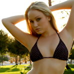 First pic of Kristine rocking some bikinis at the park.