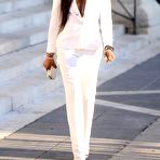 Third pic of Naomi Campbell no bra under white jacket at Versace Fashion Show