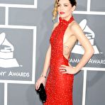 First pic of Skylar Grey side of boob in red dress