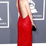Third pic of Skylar Grey side of boob in red dress