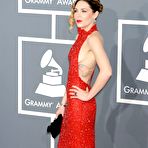 Fourth pic of Skylar Grey side of boob in red dress