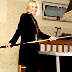 First pic of Blonde Mia Stone strips her male suit and poses in noting but tie by the pool table.