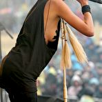Fourth pic of Taylor Momsen flashes ner tits on the stage