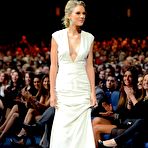 Third pic of Taylor Swift slight cleavage in white night dress