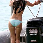 First pic of Tulisa Contostavlos in blue bikini on a beach & yacht