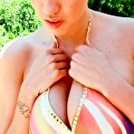 First pic of The bit titted bimbo Kelly Divine is playing with burning hot body outdoor